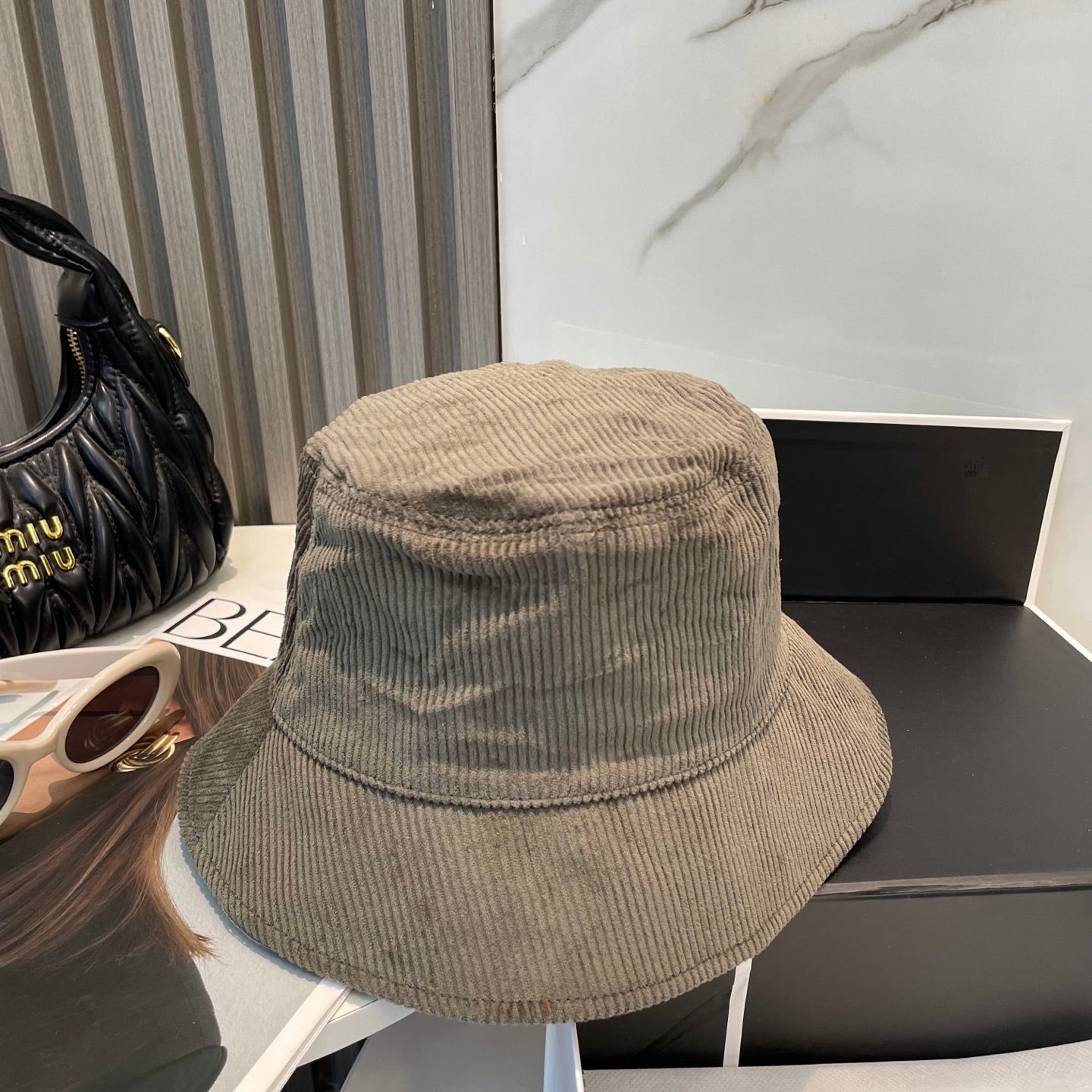 MIUMIU BUCKET IN MUTED BROWN VELVET WITH LOGO