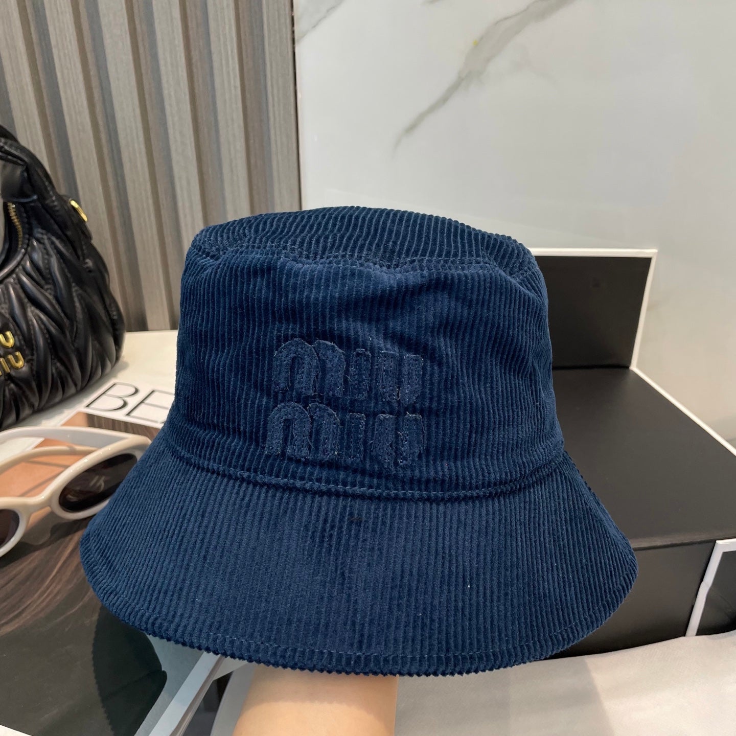 MIUMIU BUCKET IN NAVY BLUE VELVET WITH LOGO