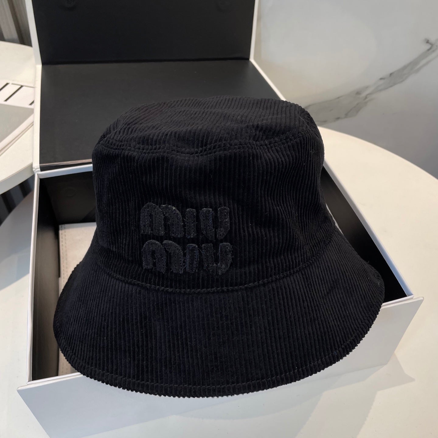 MIUMIU BUCKET IN BLACK VELVET WITH LOGO