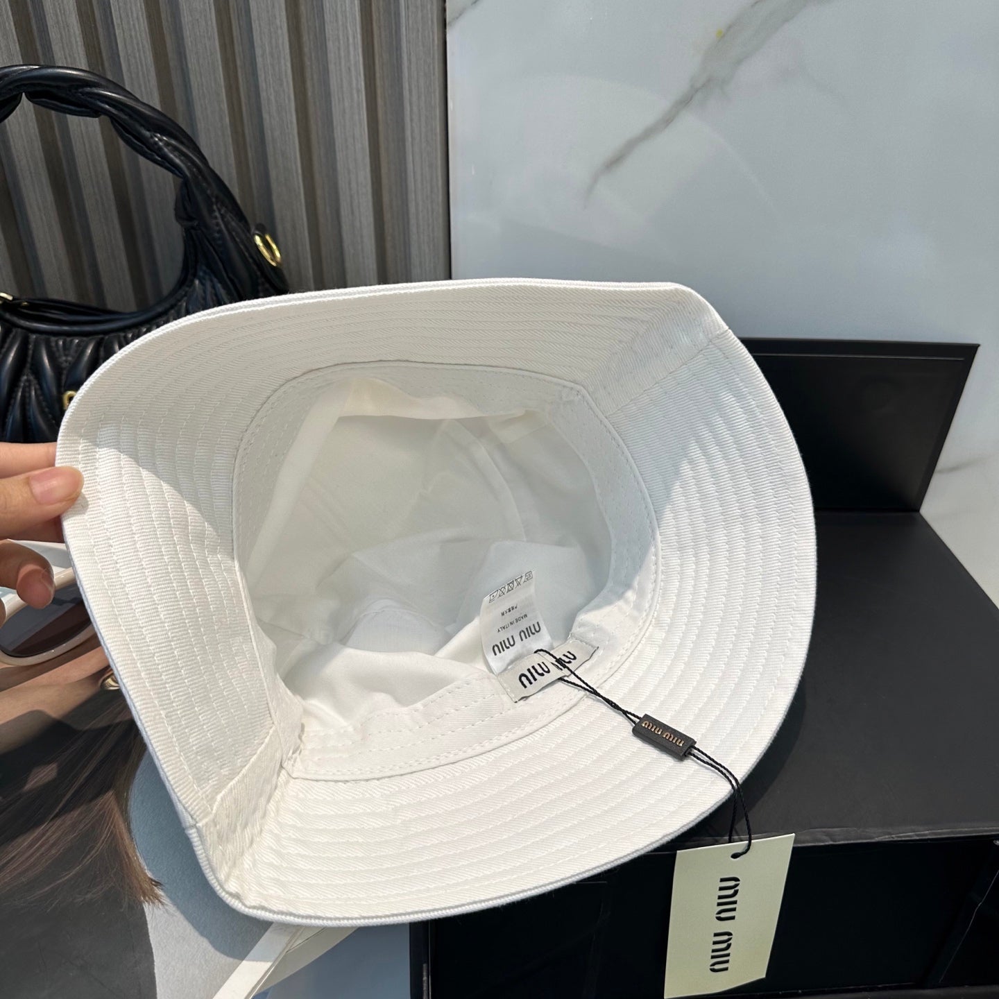 MIUMIU BUCKET HAT STYLE 30