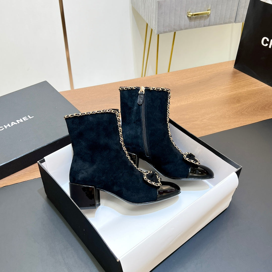 CHANEL 25S HEELED CHAIN BOOTS WITH BOW IN BLACK VELVET GOLD HARDWARE