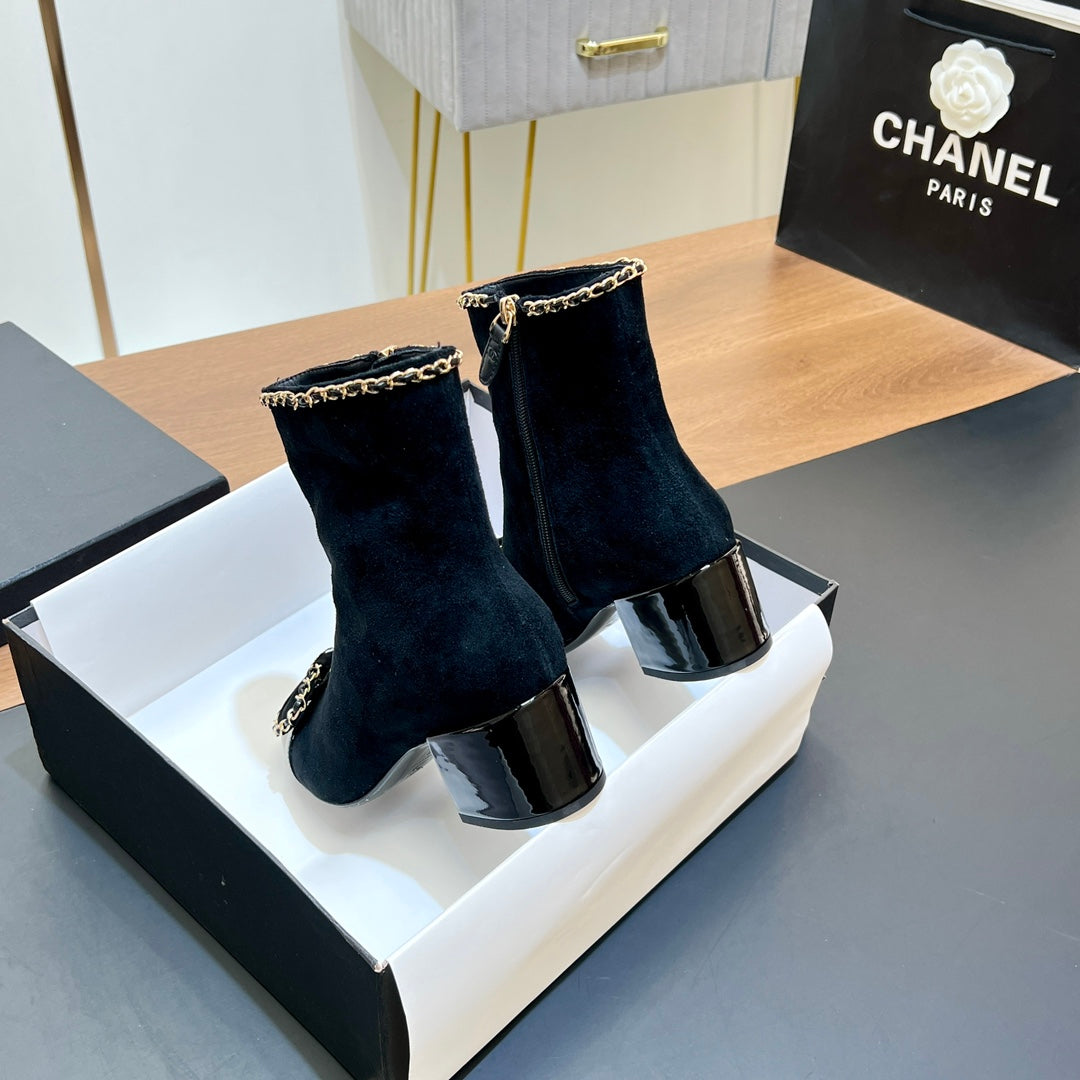 CHANEL 25S HEELED CHAIN BOOTS WITH BOW IN BLACK VELVET GOLD HARDWARE