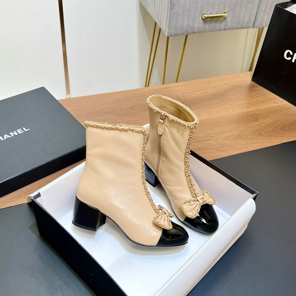 CHANEL 25S HEELED CHAIN BOOTS WITH BOW IN BEIGE CALFSKIN GOLD HARDWARE