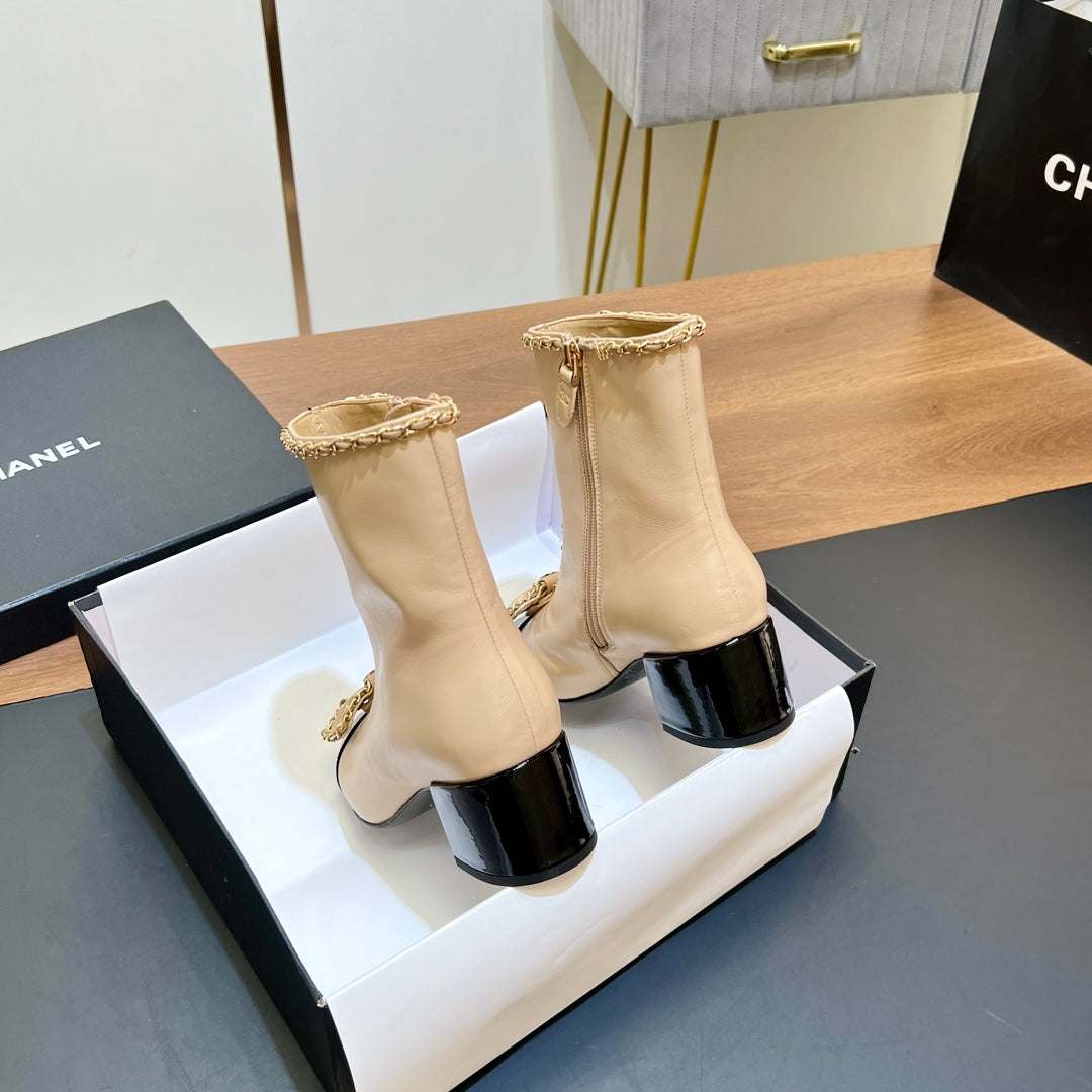 CHANEL 25S HEELED CHAIN BOOTS WITH BOW IN BEIGE CALFSKIN GOLD HARDWARE