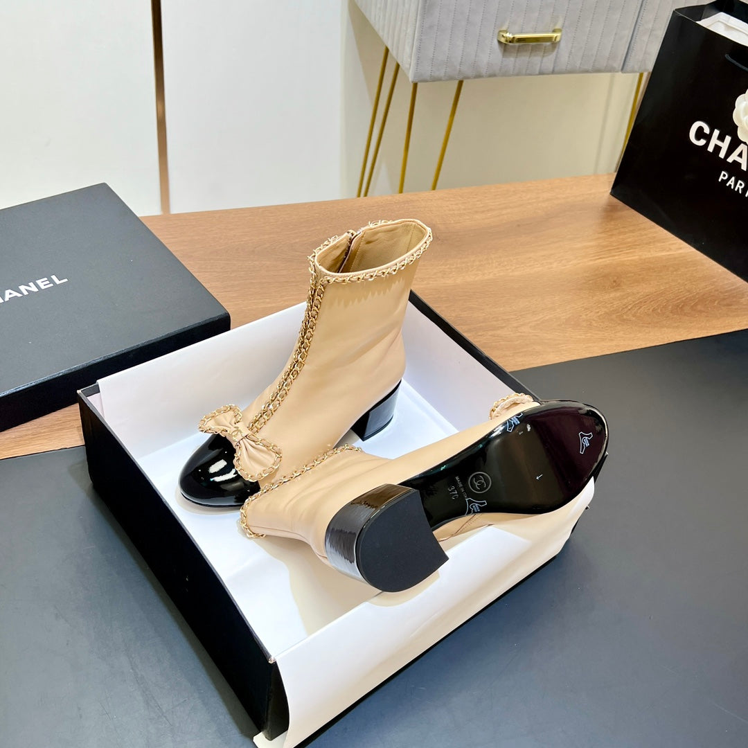 CHANEL 25S HEELED CHAIN BOOTS WITH BOW IN BEIGE CALFSKIN GOLD HARDWARE