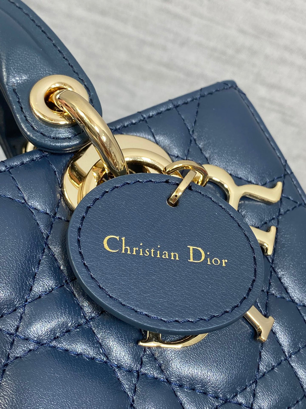 DIOR 25S SMALL LADY D‑JOY BAG 19 IN DARK BLUE CANNAGE CALFSKIN GOLD HARDWARE
