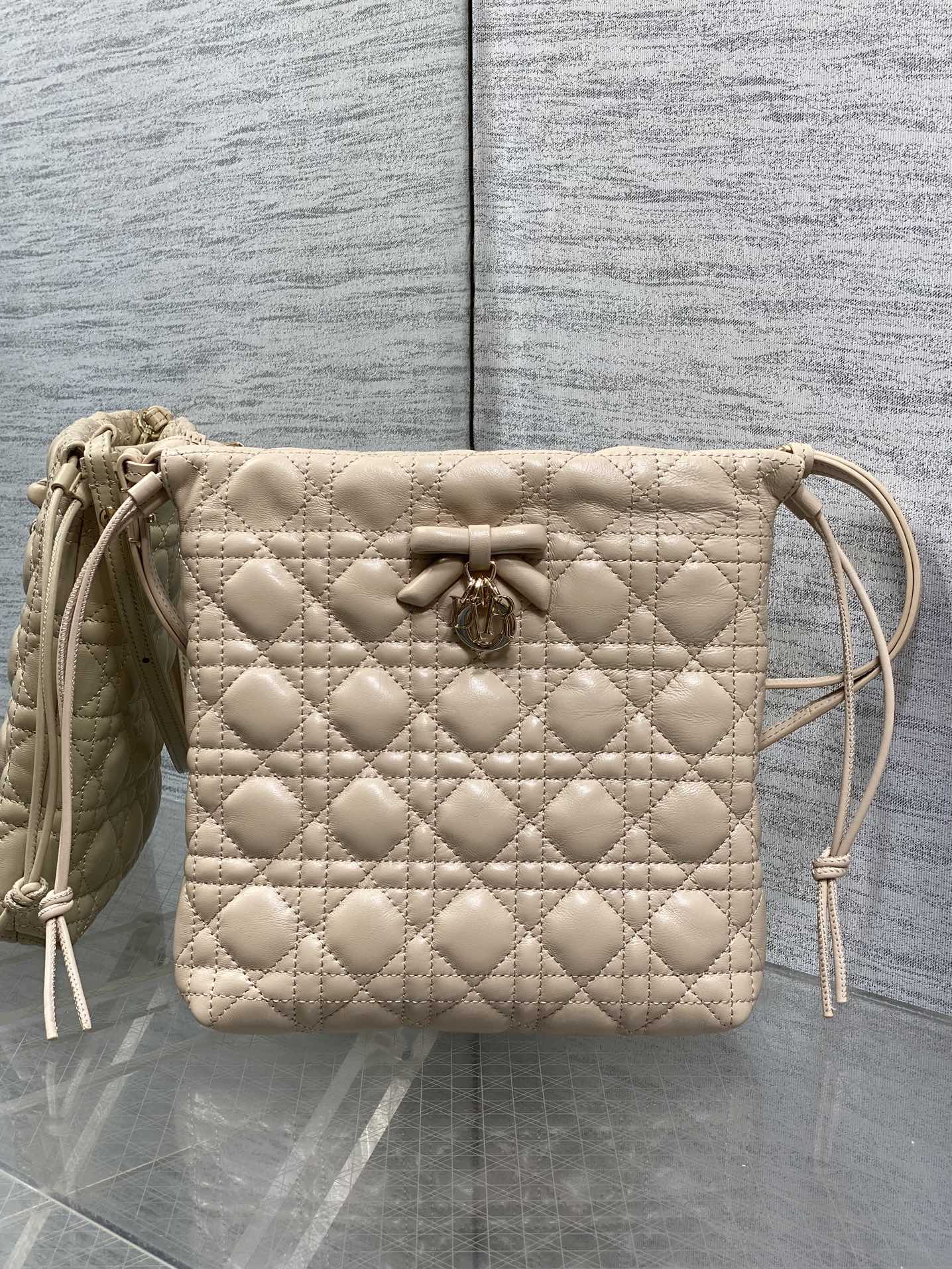 DIOR 26S ADIORABLE BUCKET BAG 20 IN BEIGE LAMBSKIN