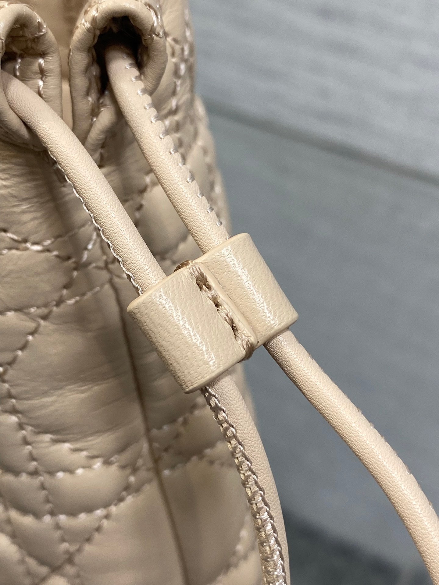 DIOR 26S ADIORABLE BUCKET BAG 20 IN BEIGE LAMBSKIN