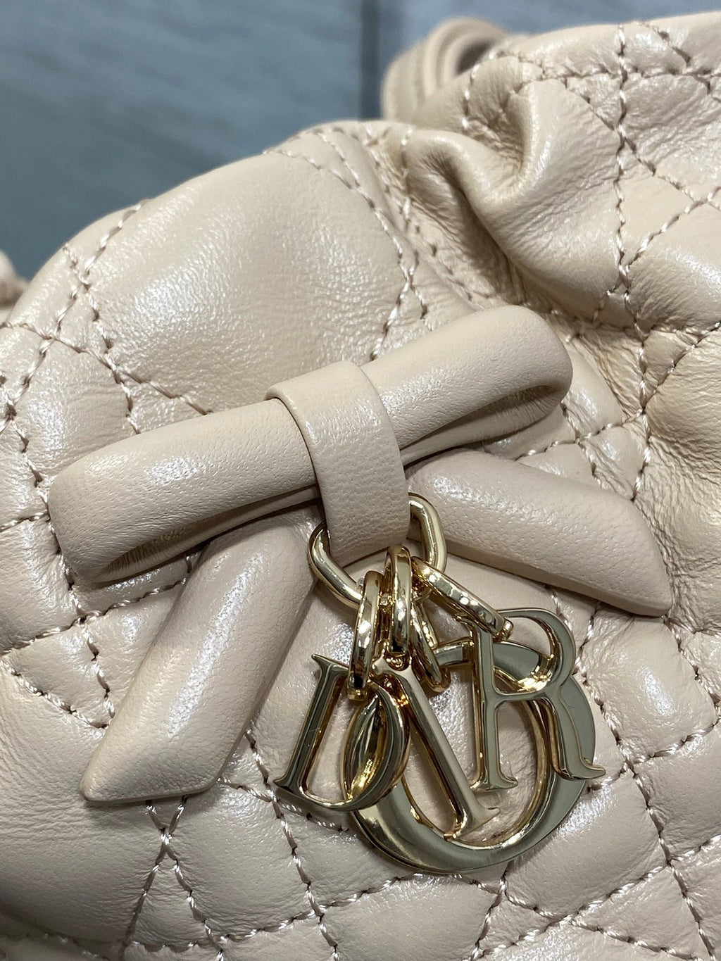 DIOR 26S ADIORABLE BUCKET BAG 20 IN BEIGE LAMBSKIN