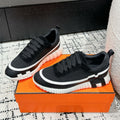 BOUNCING SNEAKER IN BLACK MIX WHITE CALFSKIN AND FABRIC