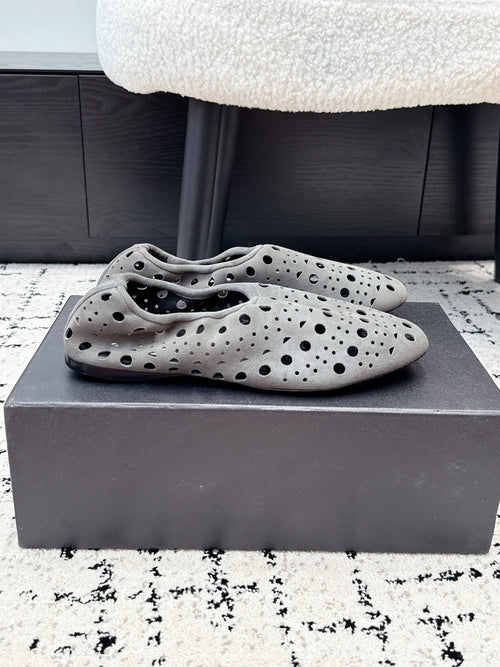 ALAIA 26S FLAT SLIP-ONS IN GREY SUEDE WITH OPENWORK PATTERN