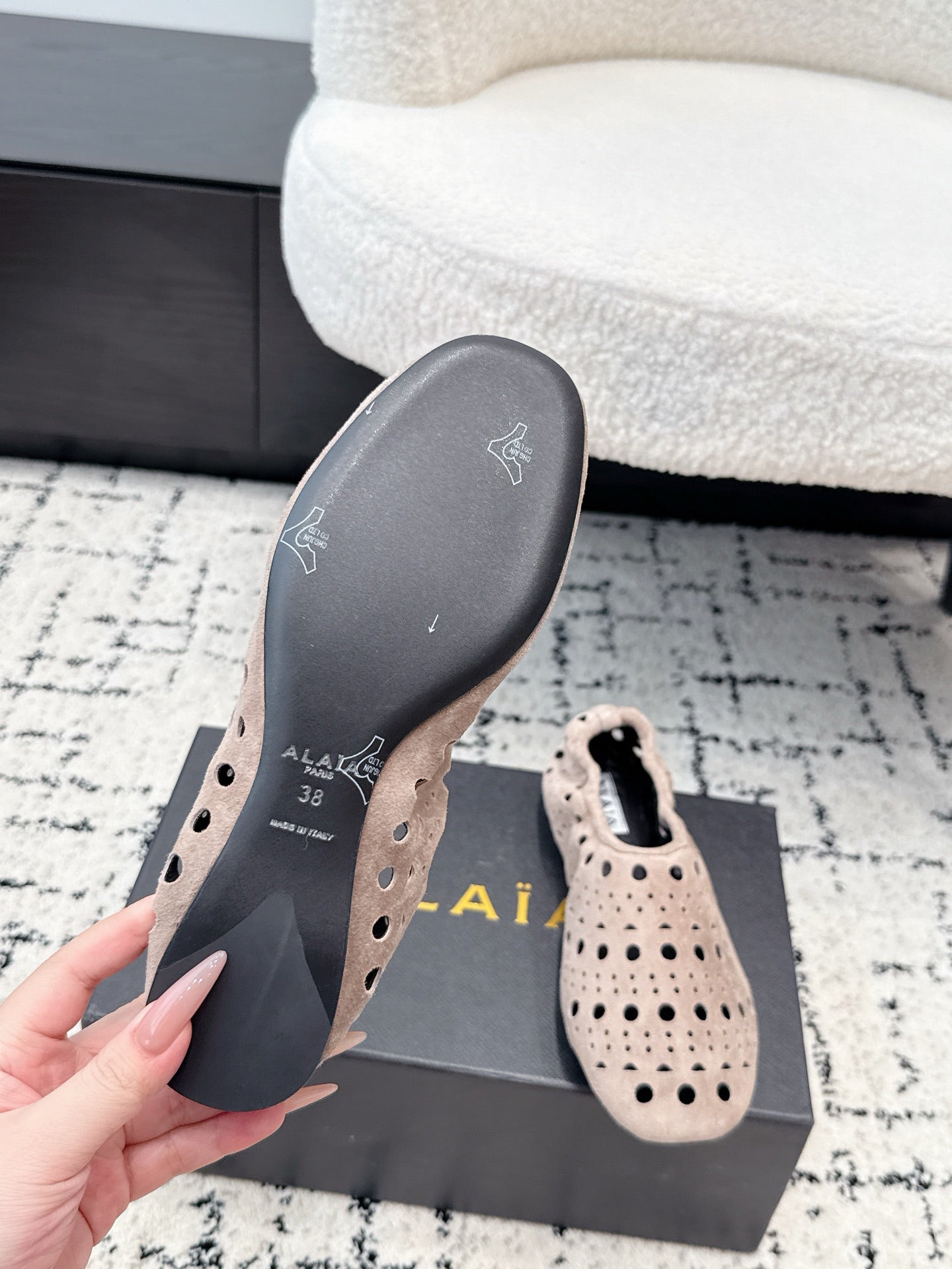 ALAIA 26S FLAT SLIP-ONS IN NUDE PINK SUEDE WITH OPENWORK PATTERN