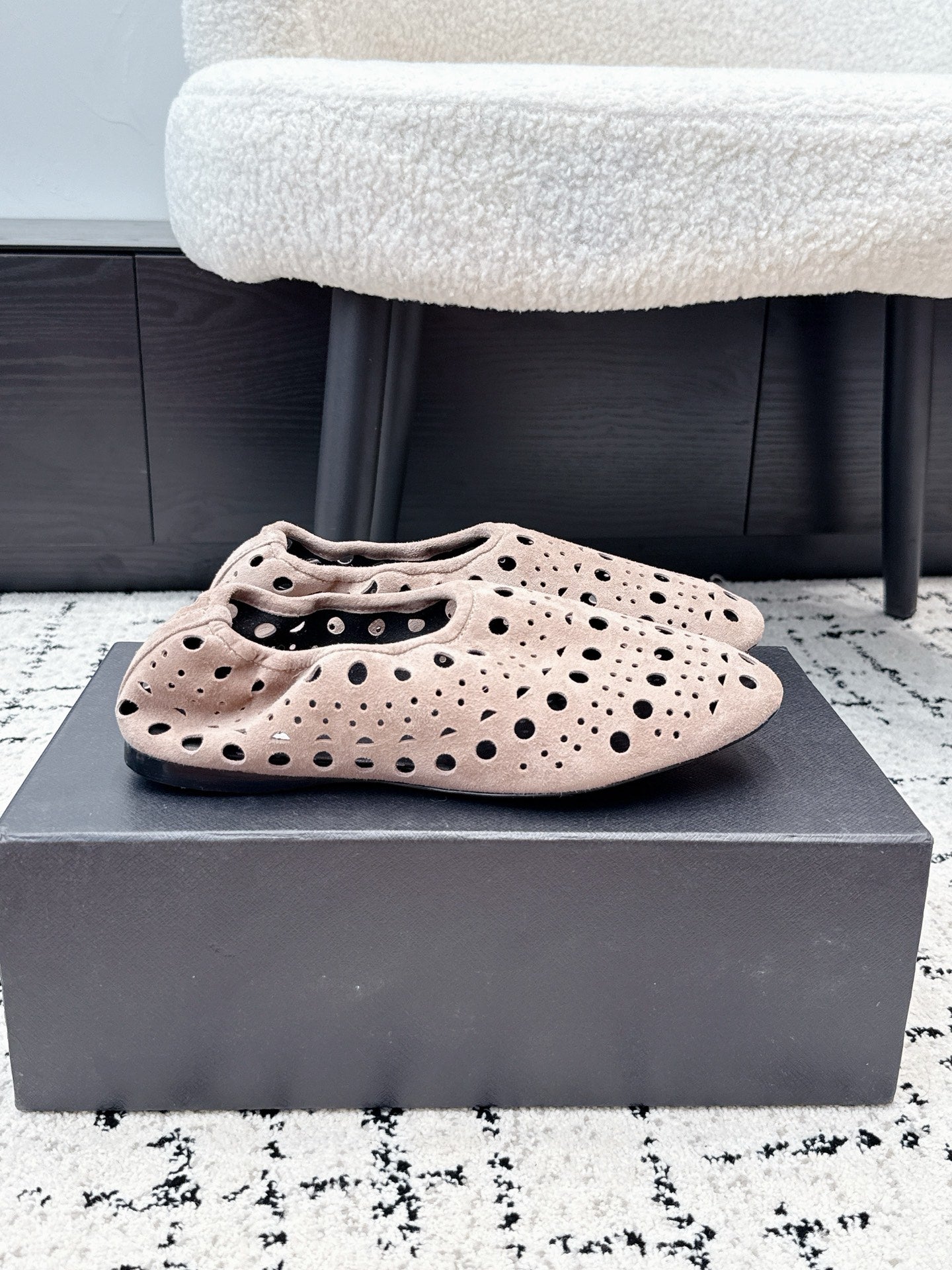 ALAIA 26S FLAT SLIP-ONS IN NUDE PINK SUEDE WITH OPENWORK PATTERN