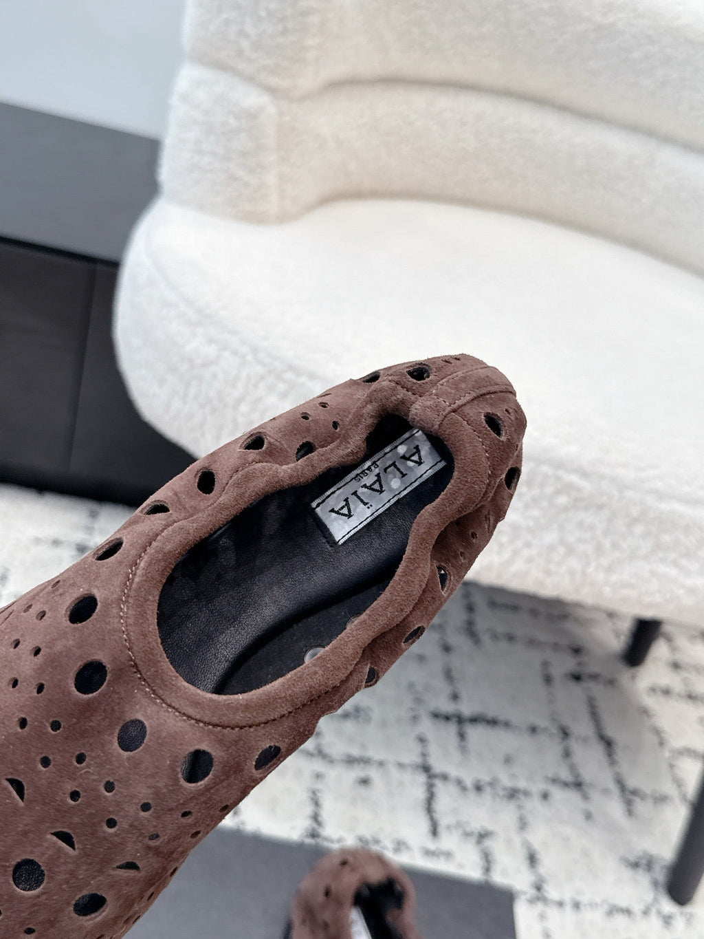 ALAIA 26S FLAT SLIP-ONS IN DARK BROWN SUEDE WITH OPENWORK PATTERN