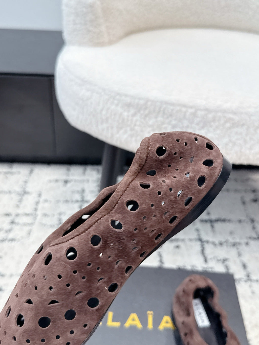 ALAIA 26S FLAT SLIP-ONS IN DARK BROWN SUEDE WITH OPENWORK PATTERN
