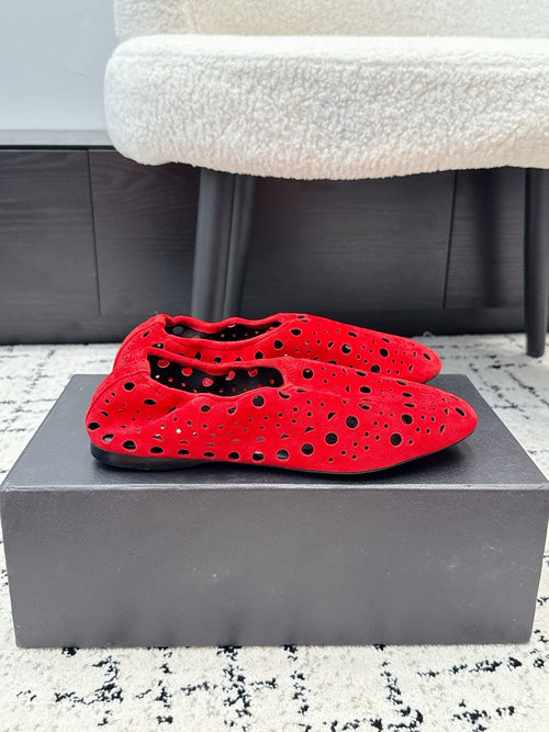 ALAIA 26S FLAT SLIP-ONS IN RED SUEDE WITH OPENWORK PATTERN