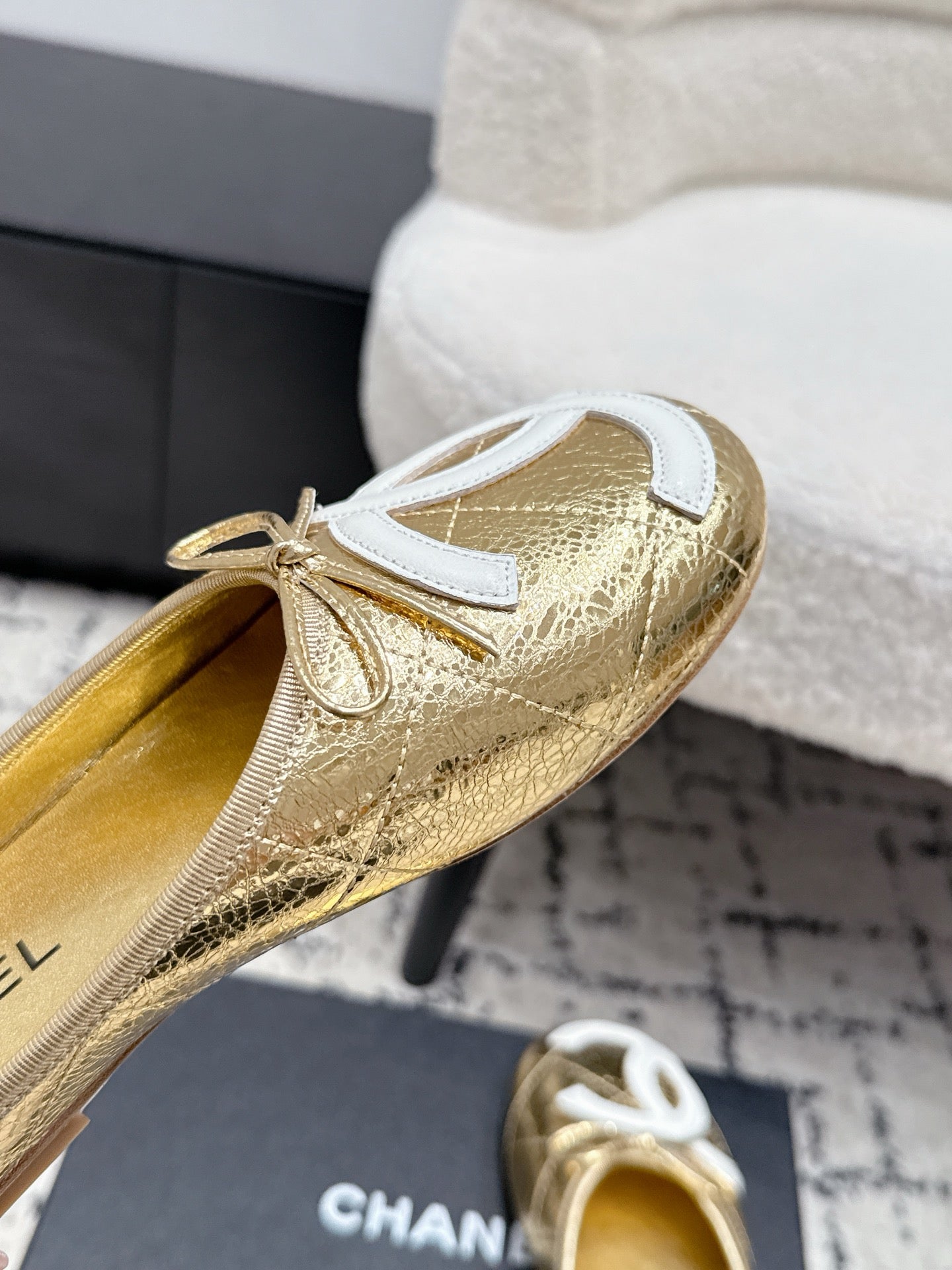 CHANEL 26S FLAT MULES IN GOLD LAMBSKIN