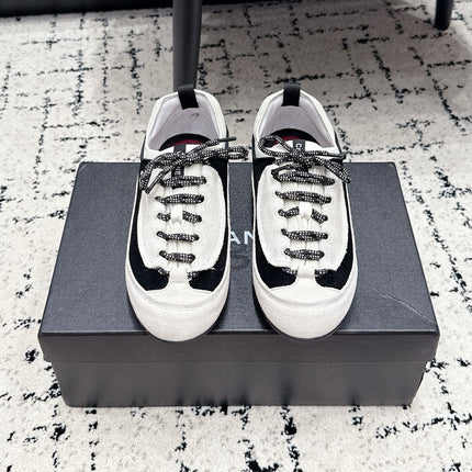 CHANEL 26S LACE-UP SNEAKERS IN WHITE AND BLACK SUEDE STYLE 2