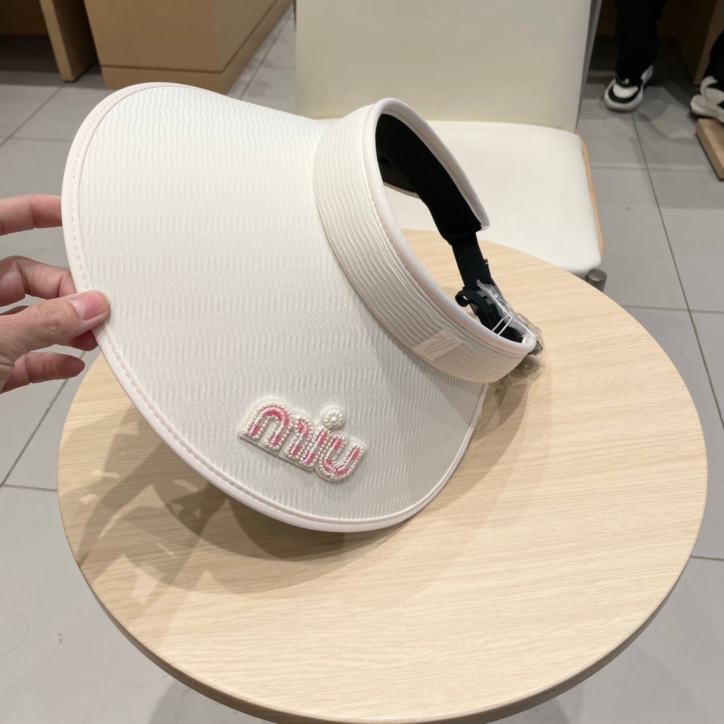 MIUMIU FASHION VISOR CAP IN BLACK AND WHITE WITH LOGO TEXT EMBROIDERY