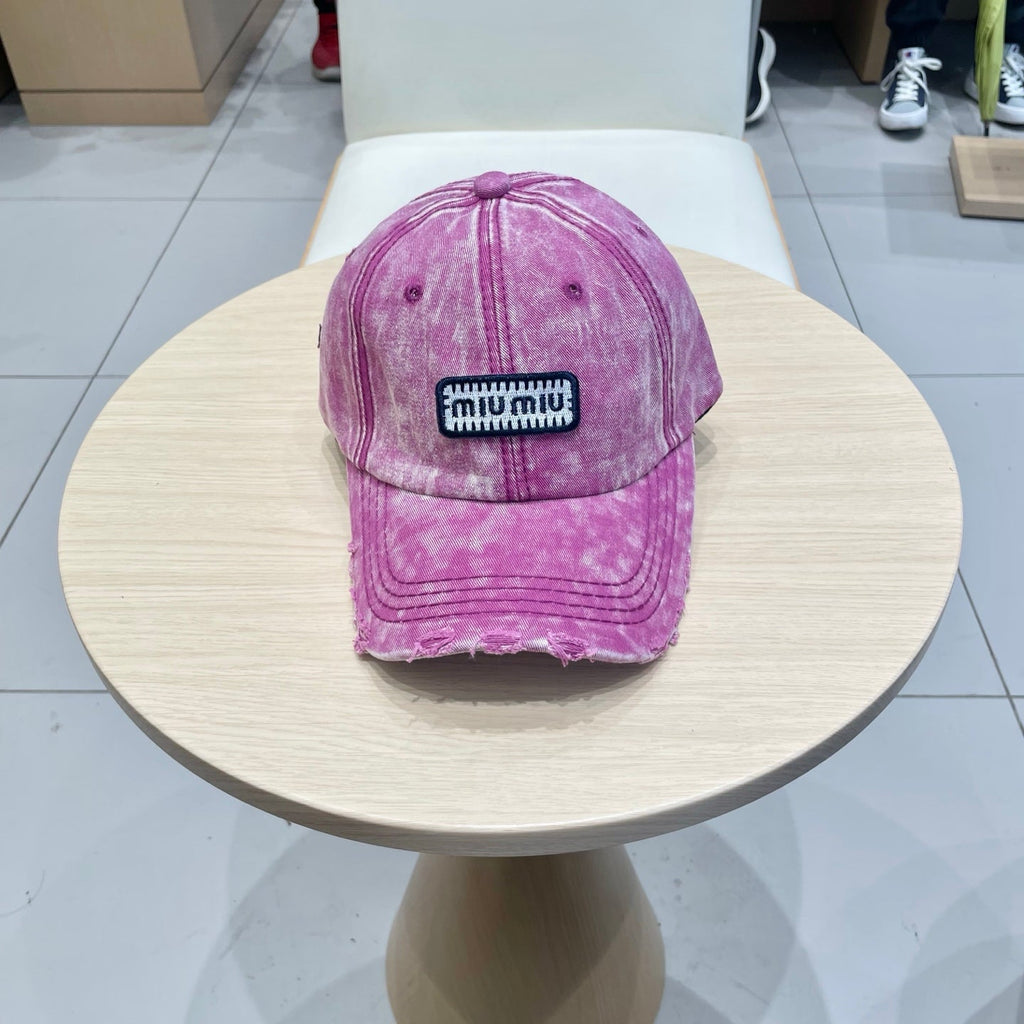MIUMIU DISTRESSED FABRIC BASEBALL CAP IN PINK WITH EMBROIDERED LOGO
