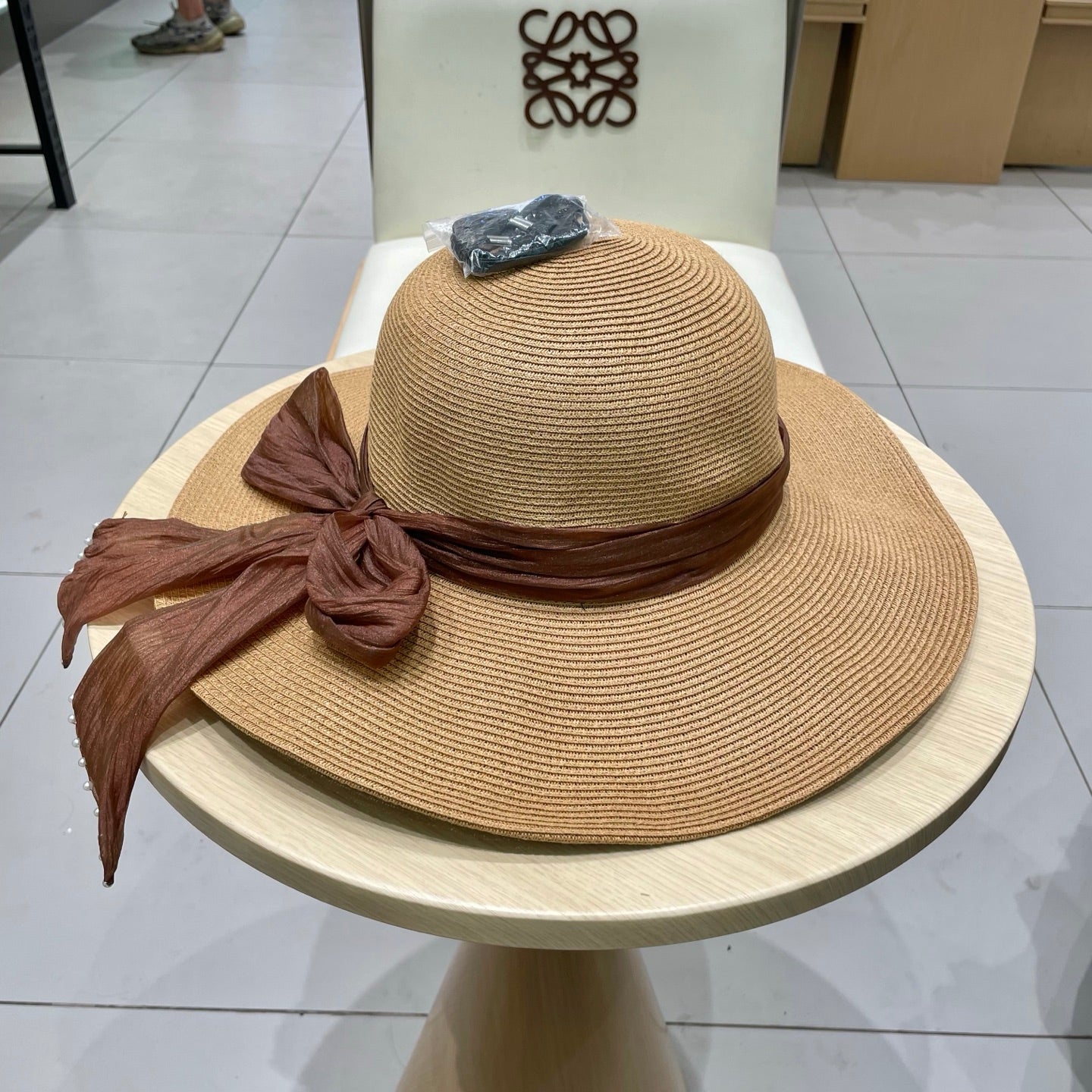 MIUMIU WIDE-BRIM BEACH HAT IN BEIGE WITH FABRIC BOW