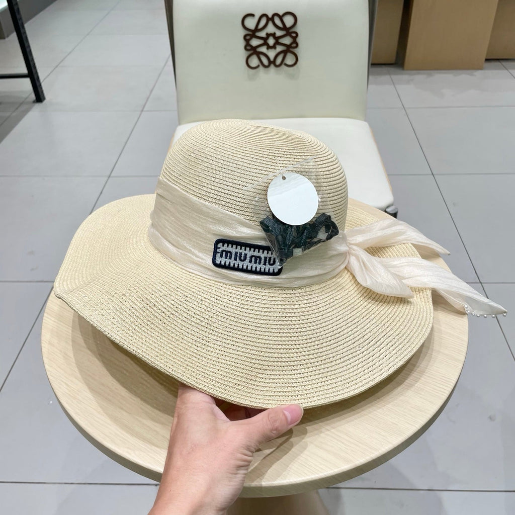 MIUMIU WIDE-BRIM BEACH HAT IN LIGHT BEIGE WITH FABRIC BOW