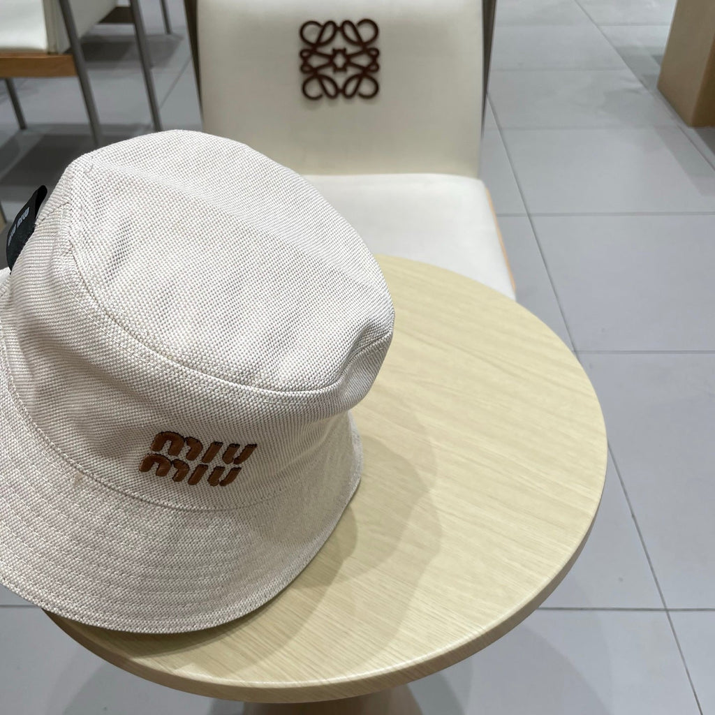 MIUMIU REVERSIBLE BUCKET HAT STYLE 81
