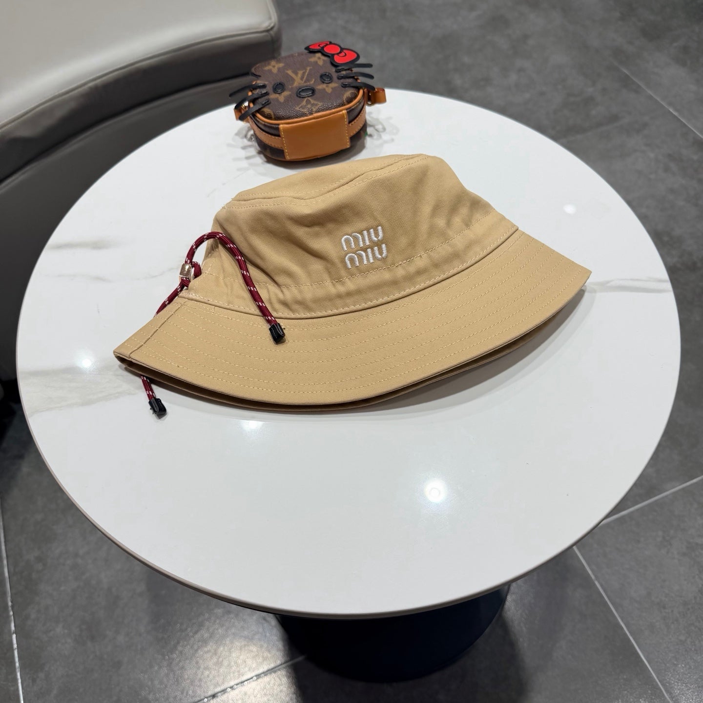MIUMIU BUCKET HAT STYLE 85