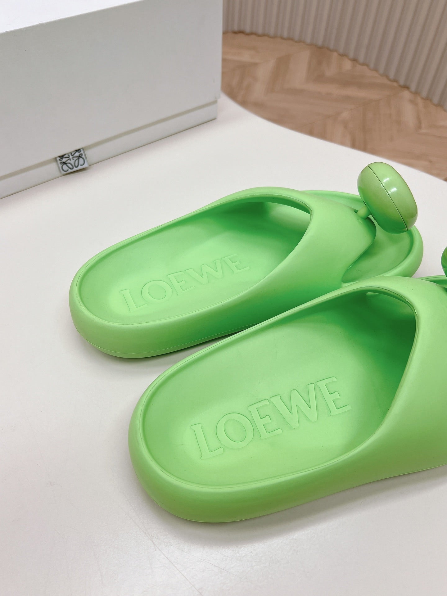 LOEWE 26S PEBBLE TOE-POST SLIDES IN LIGHT GREEN EVA
