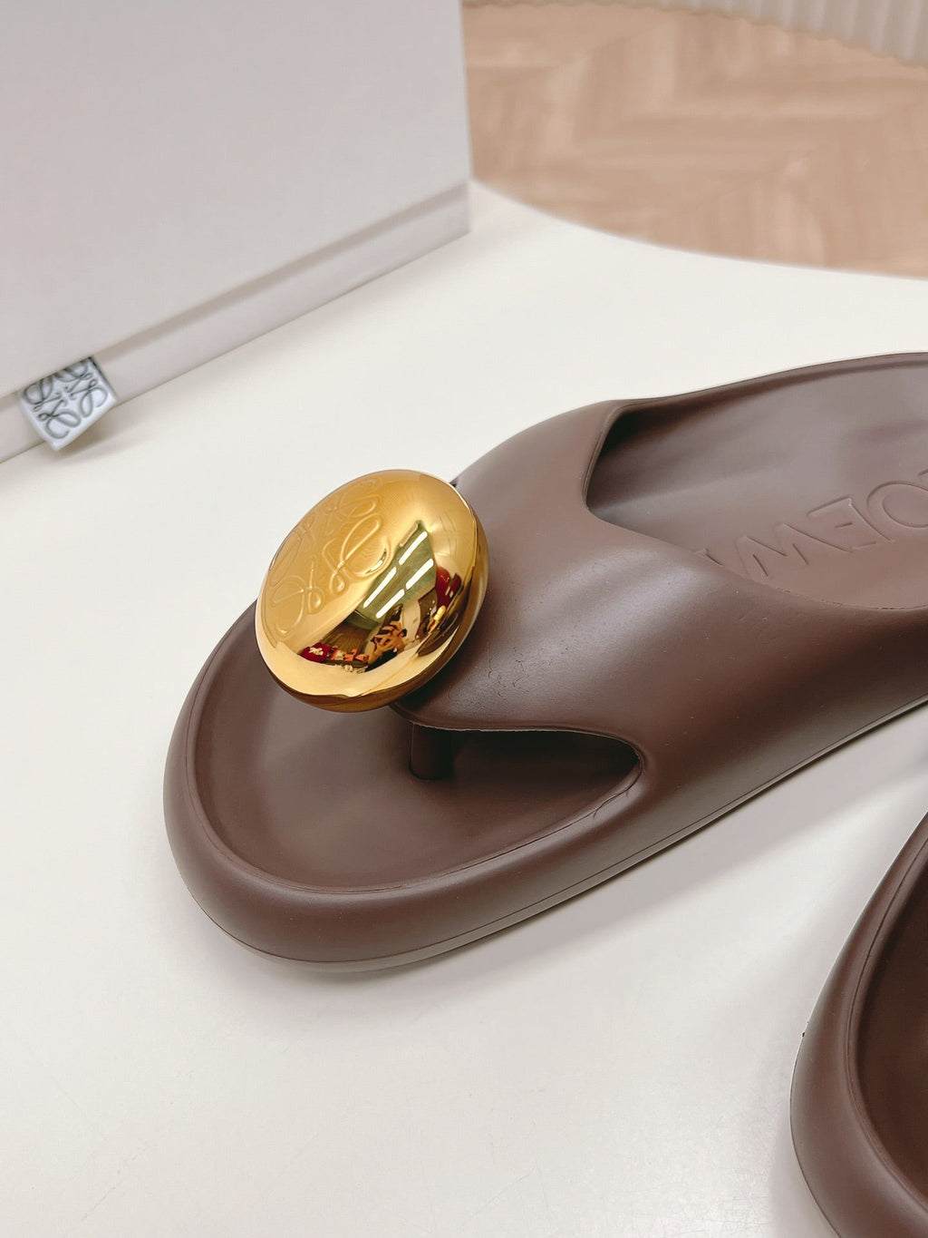 LOEWE 26S PEBBLE TOE-POST SLIDES IN DARK BROWN EVA GOLD HARDWARE
