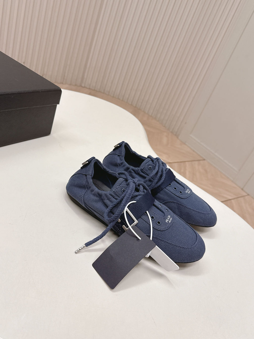 PRADA 26S LACE UP MINIMAL SNEAKERS IN NAVY BLUE CANVAS
