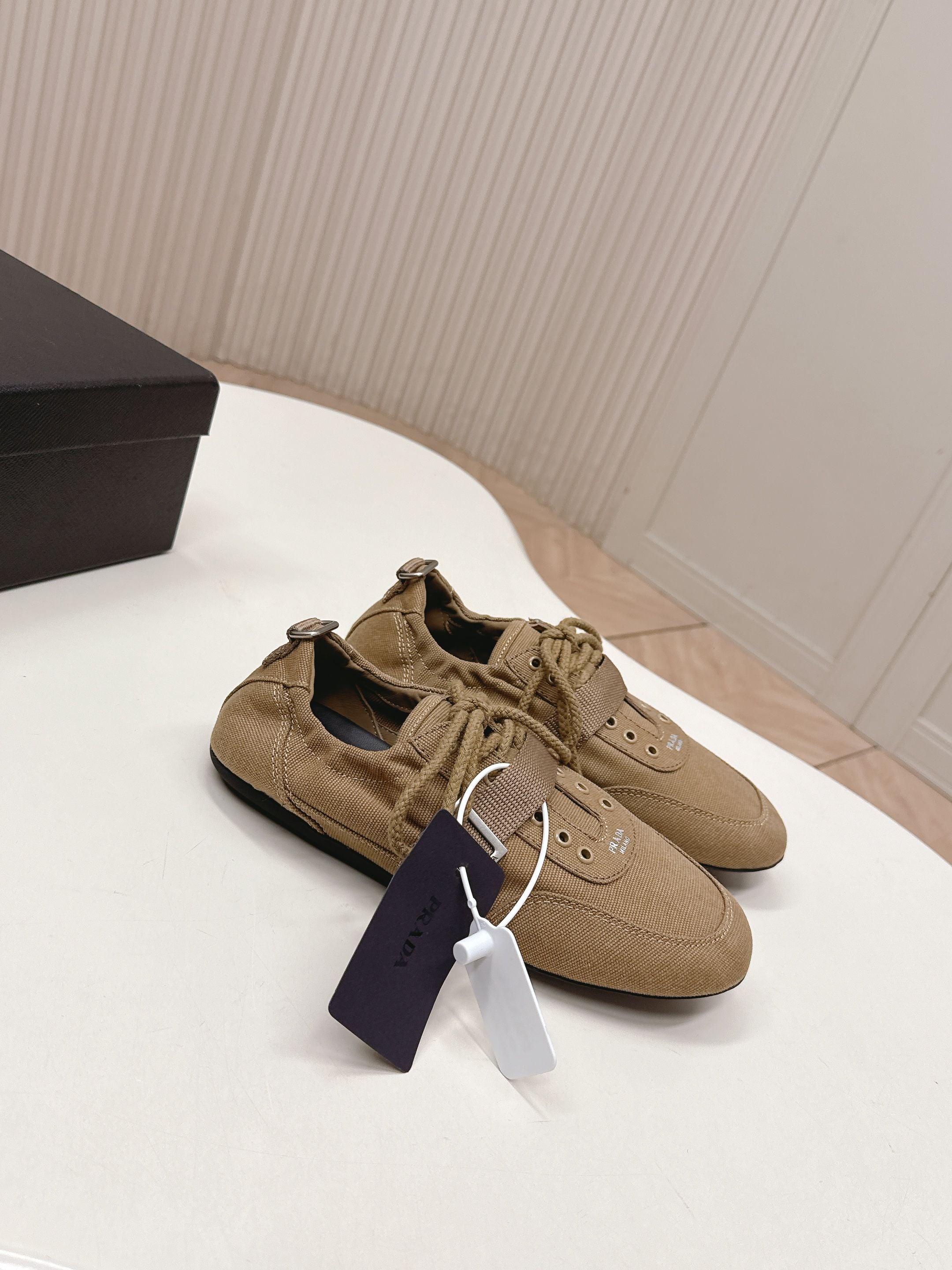 PRADA 26S LACE UP MINIMAL SNEAKERS IN BROWN CANVAS