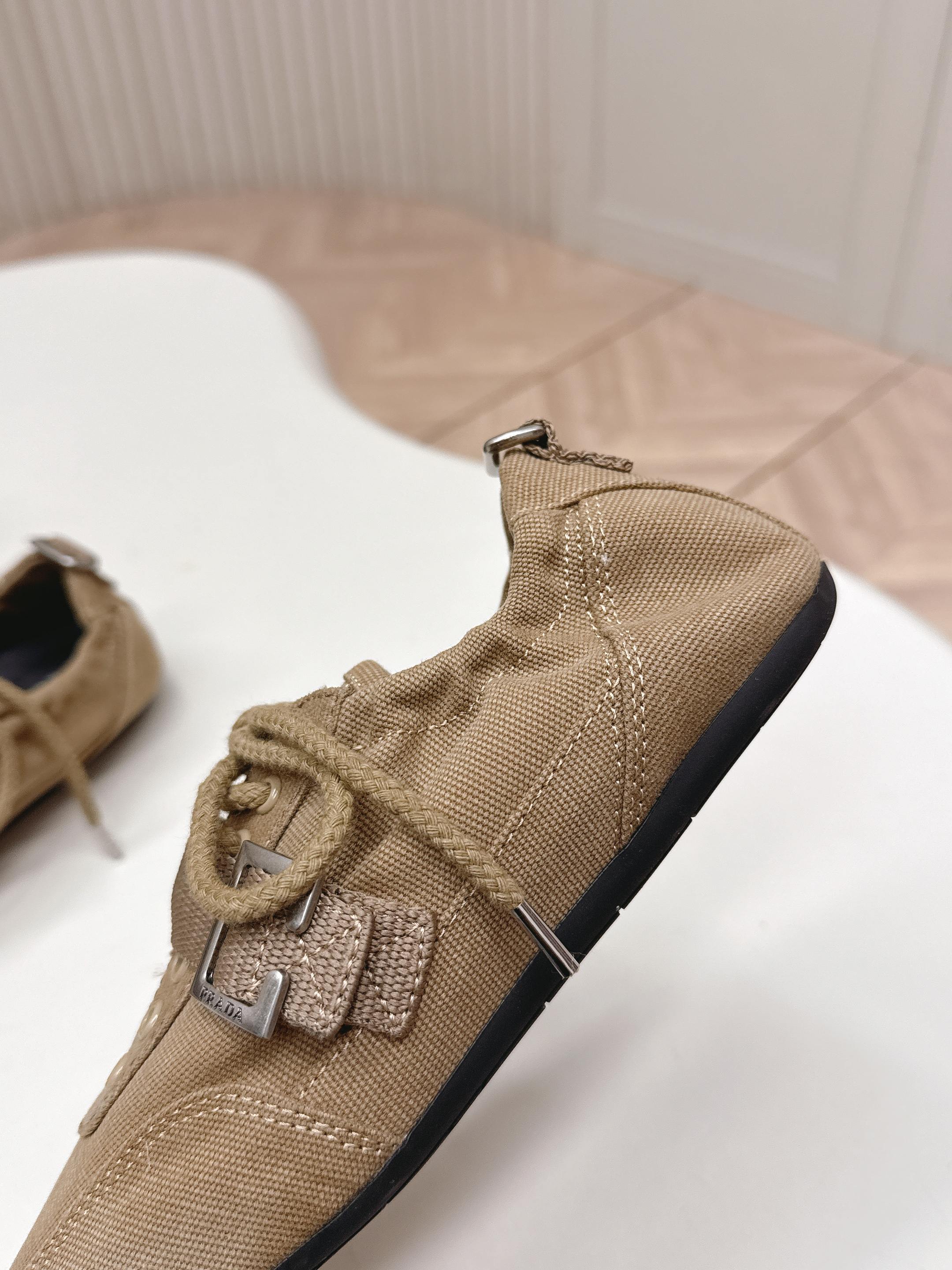 PRADA 26S LACE UP MINIMAL SNEAKERS IN BROWN CANVAS