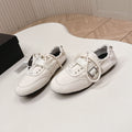 PRADA 26S LACE UP MINIMAL SNEAKERS IN WHITE CANVAS