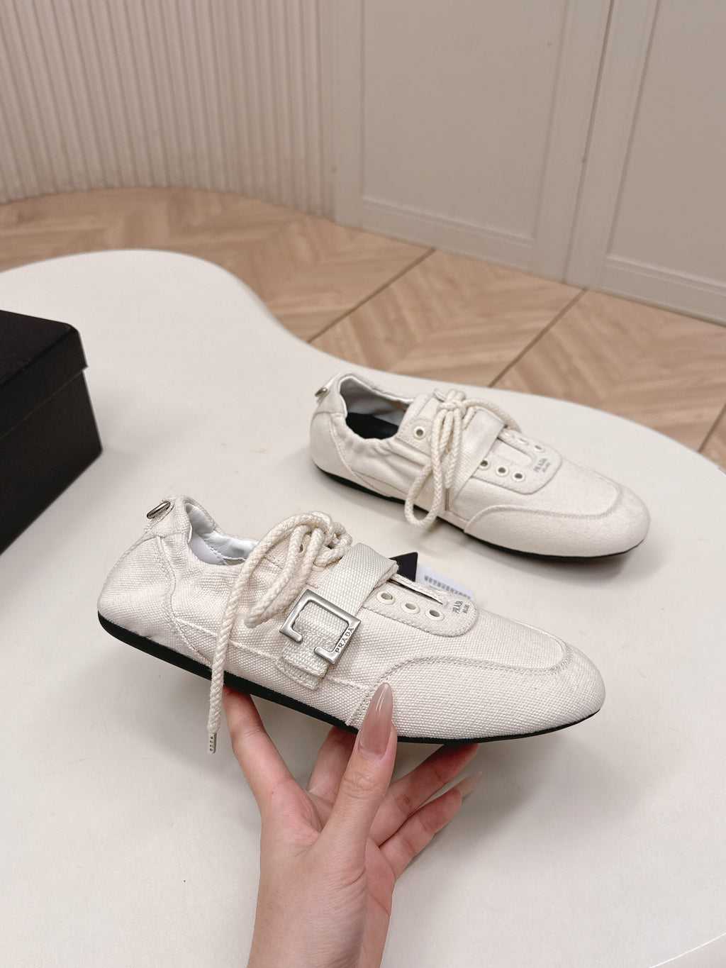 PRADA 26S LACE UP MINIMAL SNEAKERS IN WHITE CANVAS