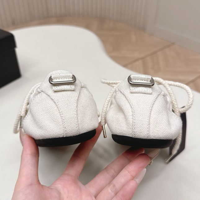 PRADA 26S LACE UP MINIMAL SNEAKERS IN WHITE CANVAS