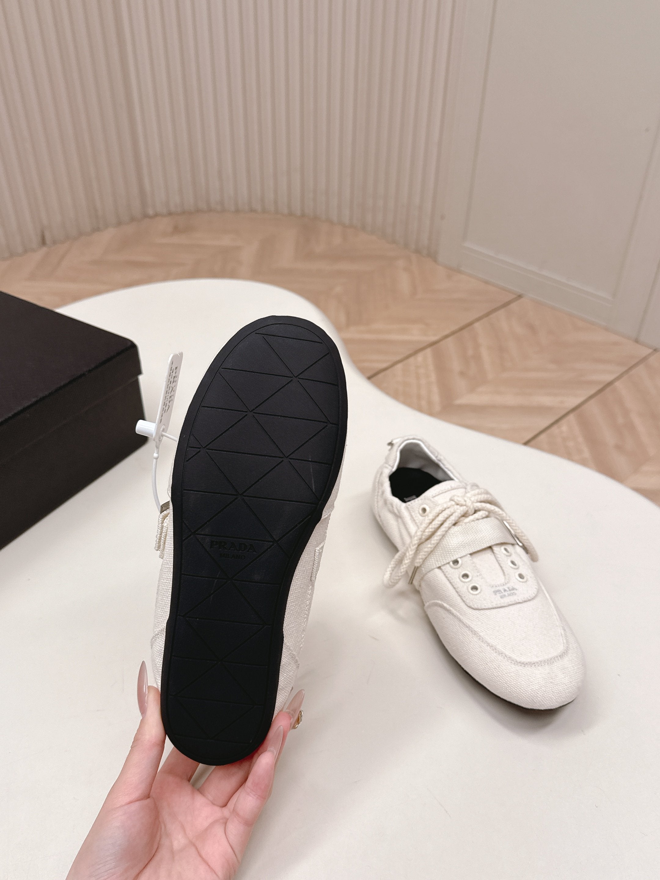 PRADA 26S LACE UP MINIMAL SNEAKERS IN WHITE CANVAS