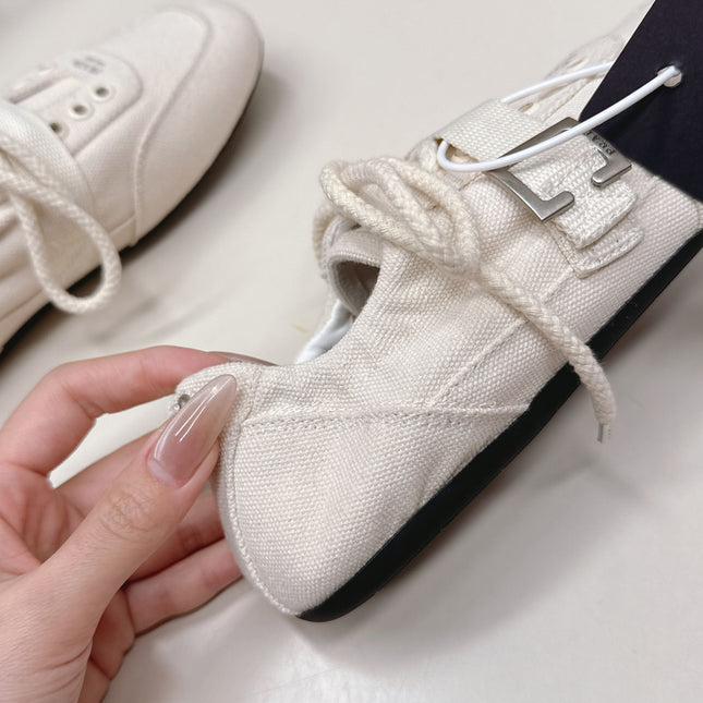 PRADA 26S LACE UP MINIMAL SNEAKERS IN WHITE CANVAS