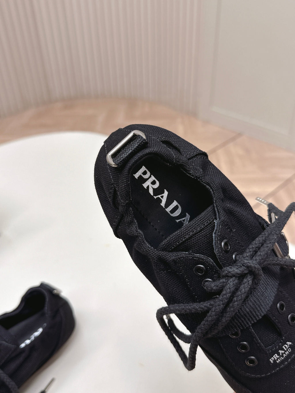 PRADA 26S LACE UP MINIMAL SNEAKERS IN BLACK CANVAS