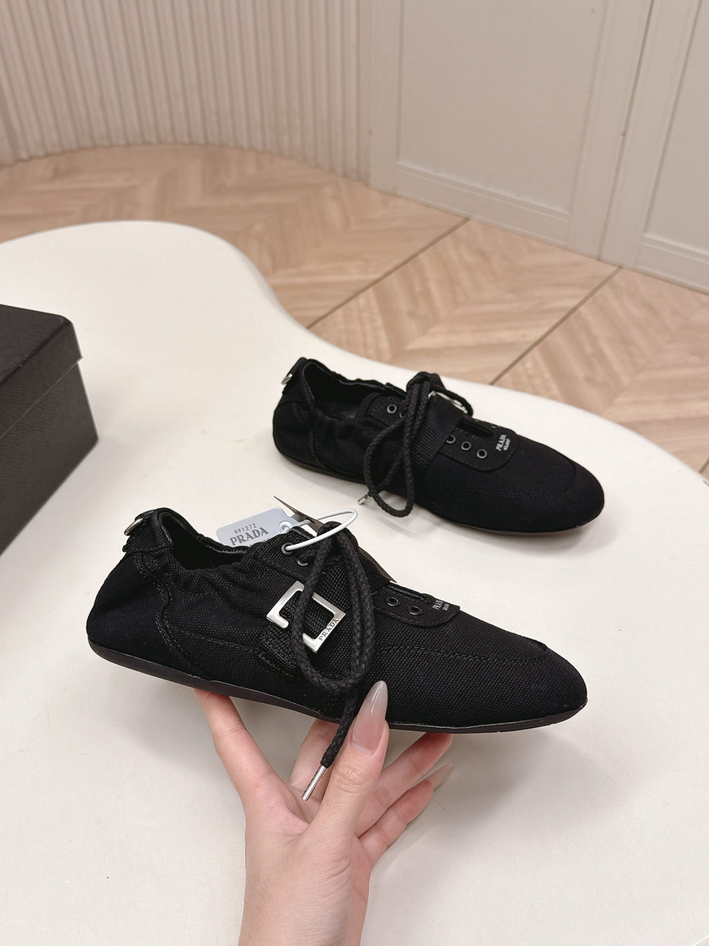 PRADA 26S LACE UP MINIMAL SNEAKERS IN BLACK CANVAS
