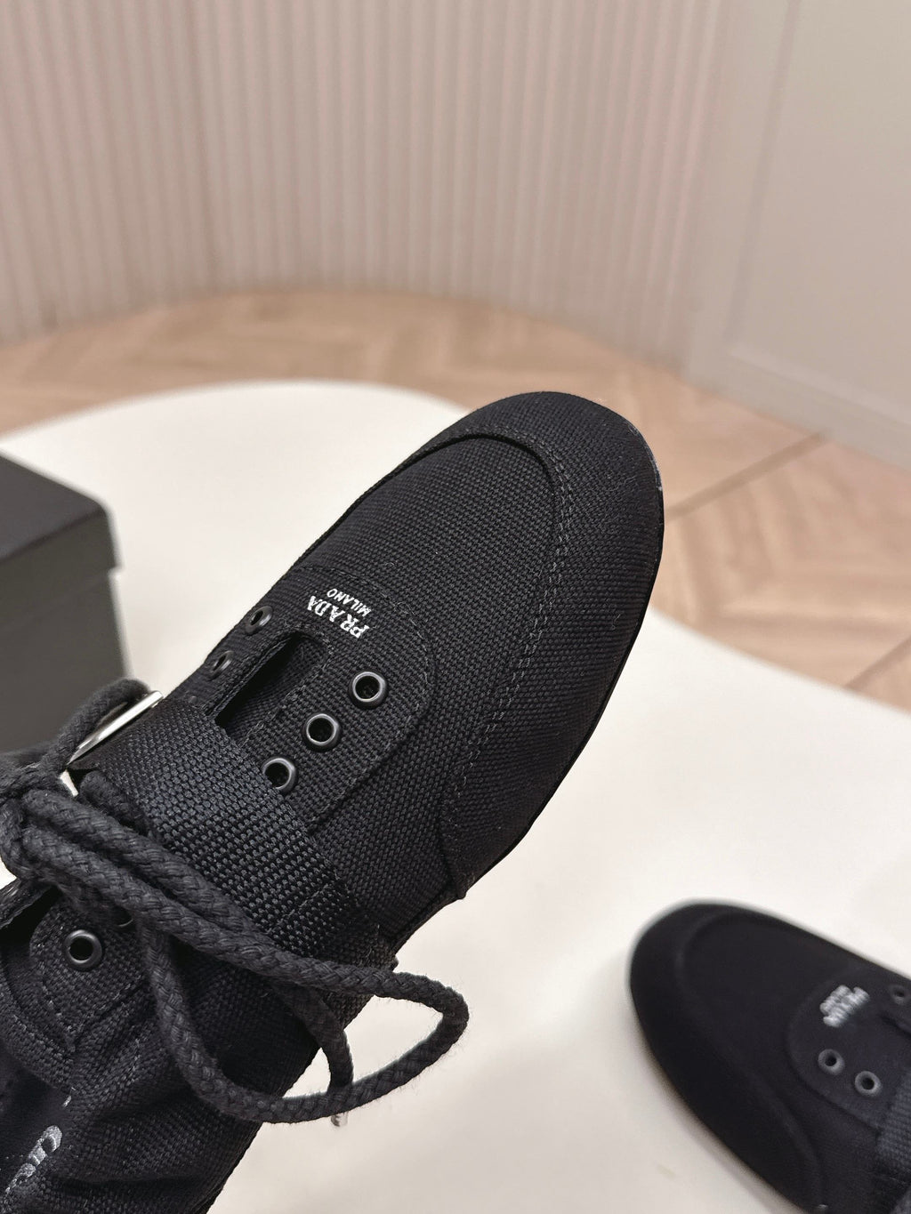 PRADA 26S LACE UP MINIMAL SNEAKERS IN BLACK CANVAS