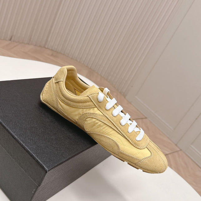 PRADA 26S SNEAKERS IN YELLOW QUILTED NYLON AND SUEDE