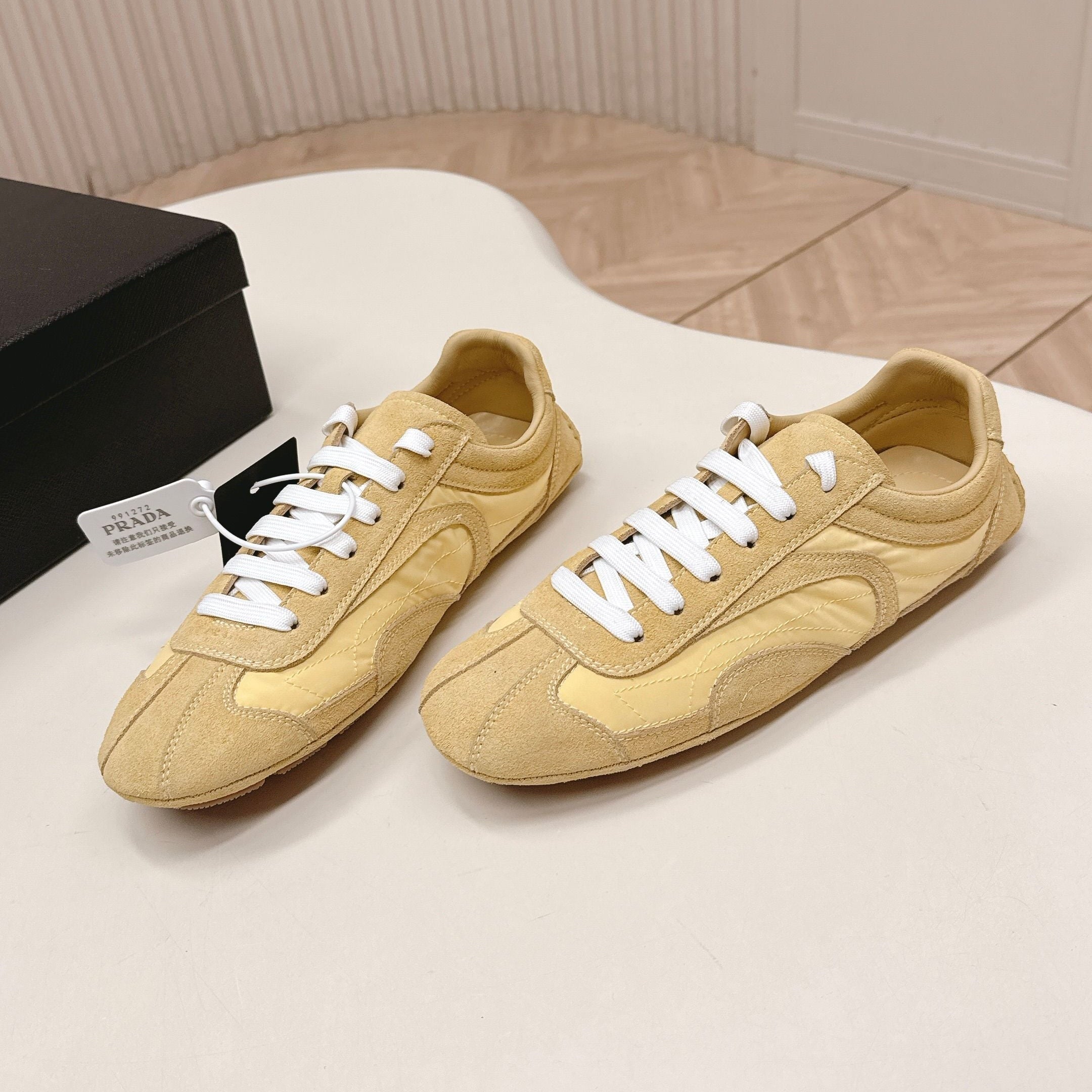 PRADA 26S SNEAKERS IN YELLOW QUILTED NYLON AND SUEDE