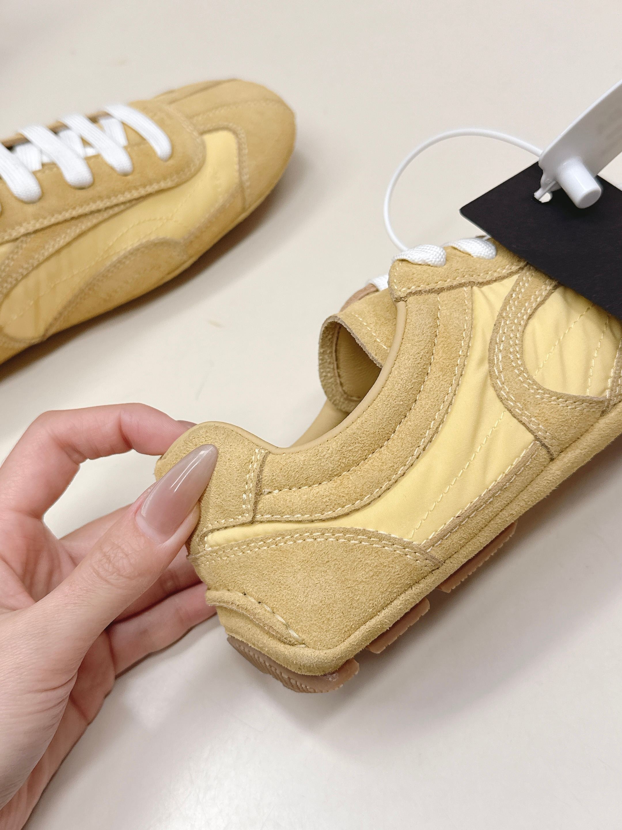 PRADA 26S SNEAKERS IN YELLOW QUILTED NYLON AND SUEDE