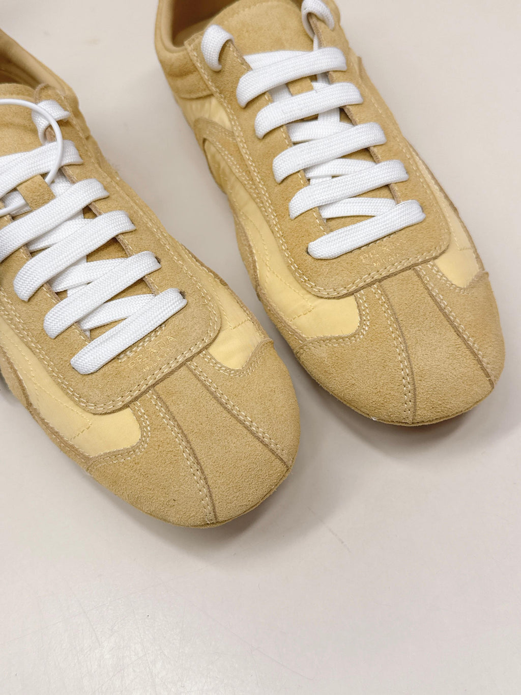 PRADA 26S SNEAKERS IN YELLOW QUILTED NYLON AND SUEDE