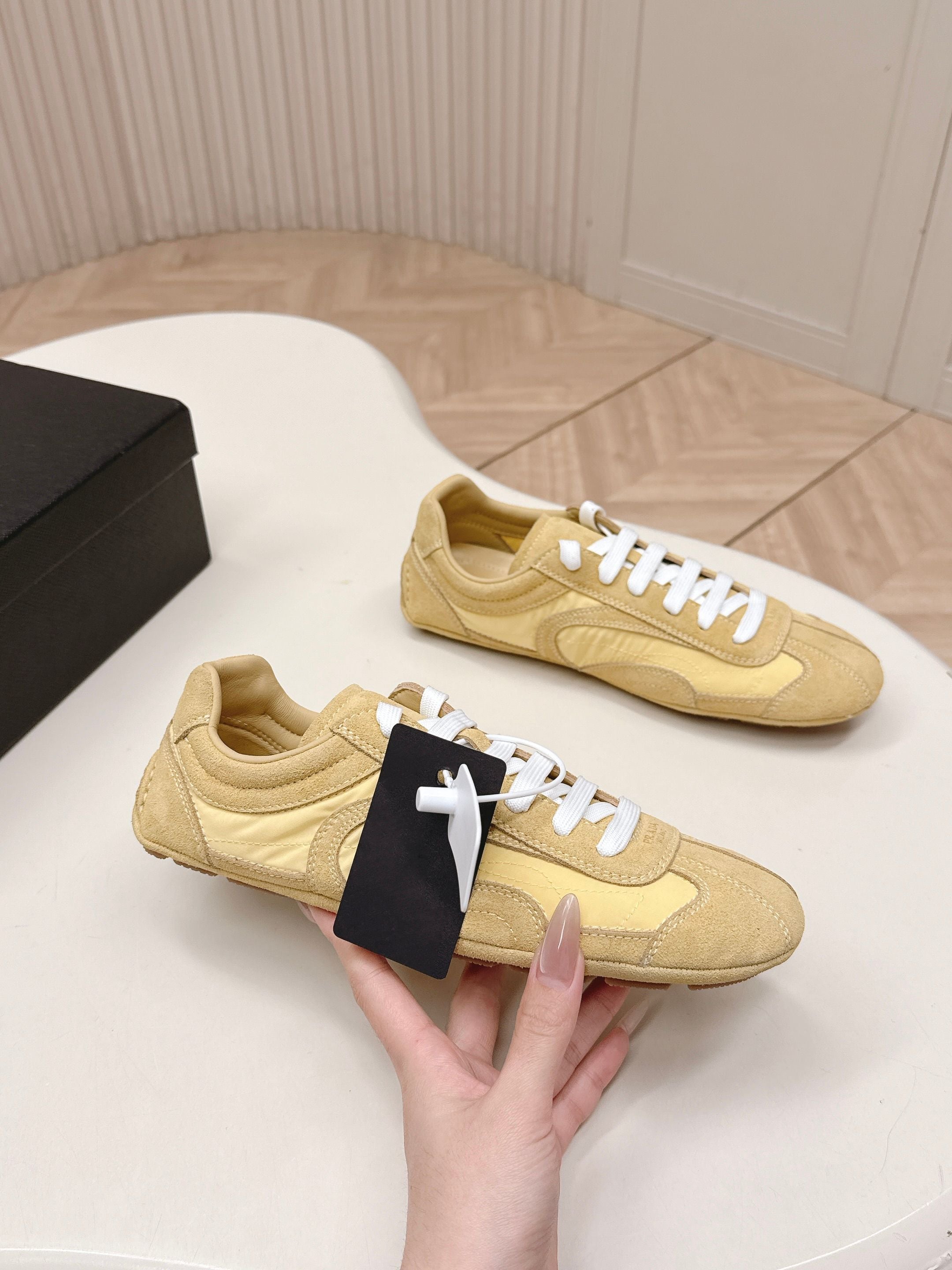 PRADA 26S SNEAKERS IN YELLOW QUILTED NYLON AND SUEDE