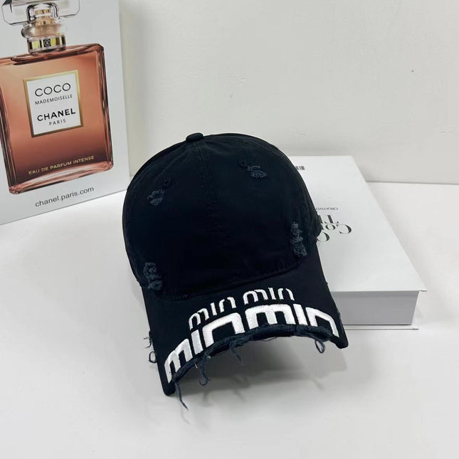 MIUMIU DISTRESSED EMBROIDERED BASEBALL CAP DENIM