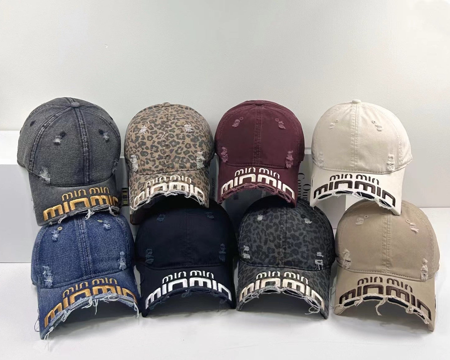 MIUMIU DISTRESSED EMBROIDERED BASEBALL CAP DENIM