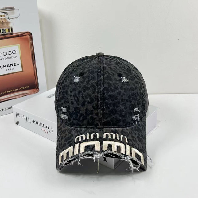 MIUMIU DISTRESSED EMBROIDERED BASEBALL CAP DENIM