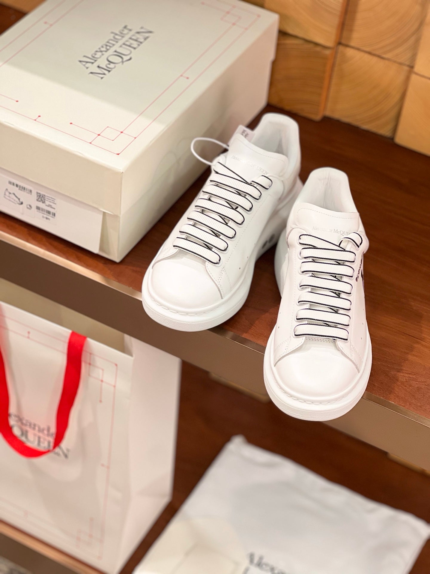 OVERSIZED SNEAKERS IN WHITE CALFSKIN CARTOON FIGURE BLACK TRIM LACES